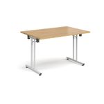 Rectangular folding leg table with white legs and straight foot rails 1200mm x 800mm - oak