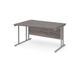 Maestro 25 left hand wave desk 1400mm wide - silver cantilever leg frame, grey oak top
