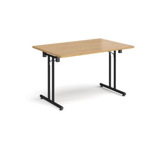 Rectangular folding leg table with black legs and straight foot rails 1200mm x 800mm - oak